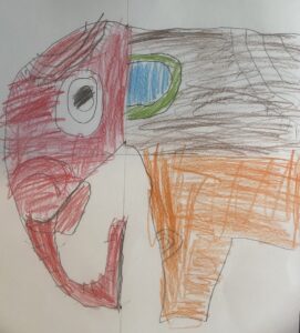 Child's crayon drawing of a parrot.